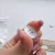 Изображение Пуговица 4 отверстия, резиновая, белый