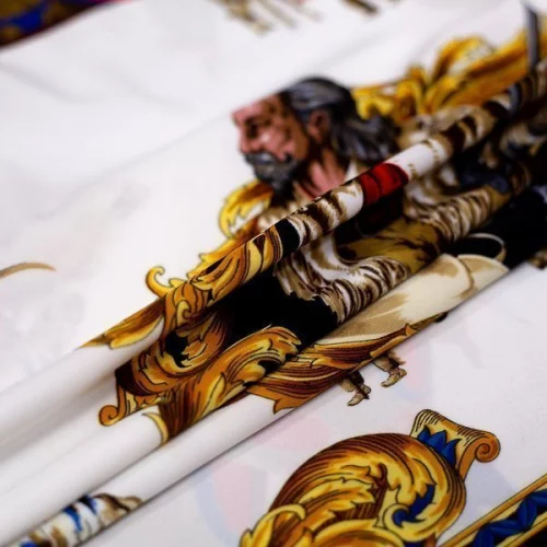 Изображение Трикотаж лайкра купон 88 см, кони индейцы и вензеля, дизайн VERSACE