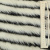 Изображение Мех искусственный в черную коротковорсовую и молочную средневорсовую полоску