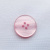 Изображение Пуговица 4 отверстия, ободок из точек, изогнутая, светло-розовый