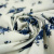 Изображение Плательная ткань молочного цвета, букеты синих цветов