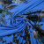 Изображение Трикотаж, графичные цветы на голубом