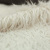 Изображение Дубленка искусственная с белоснежным длинным ворсом на темно-коричневой основе