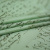 Изображение Шелк атласный стрейч фисташковый, дизайн рукописи