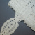 Изображение Тесьма декоративная из ленты белая со стразами