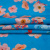 Изображение Крепдешин из натурального шелка, цветы на голубом